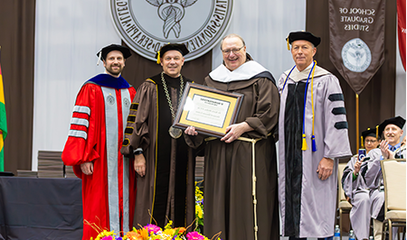 Pictured_Fr. Kevin Mullen, O.F.M., receives an honorary doctorate